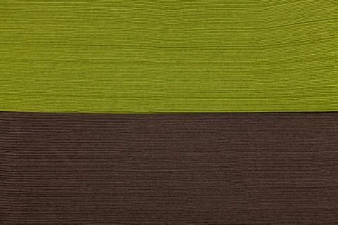 Stack of green and brown napkin paper closeup texture Stock Photos