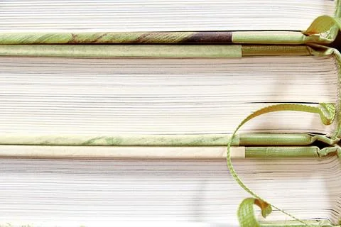 Stack of green books, side view texture Stock Photos