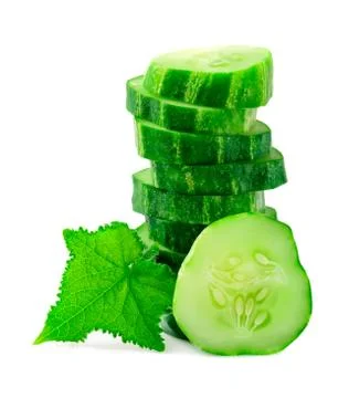 A stack of green cucumber slices with leaves on a white background. Stock Photos