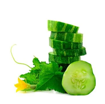 A stack of green cucumber slices with leaves on a white background. Stock Photos