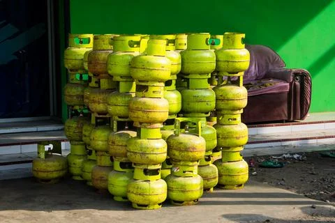 Stack of Green LPG Gas Cylinders for Domestic Cooking Energy, Group of Smal.. Stock Photos