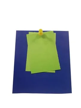 Stack of green notes on blue paper isolated on white background isolated on.. Stock Photos