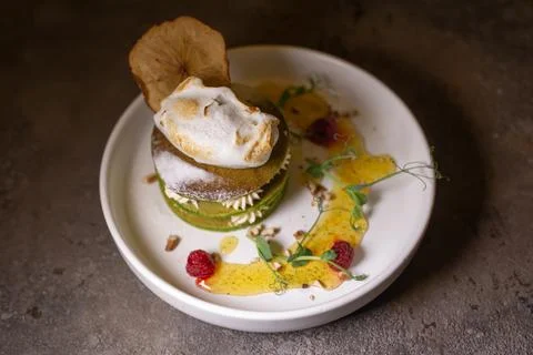 Stack of green pancakes with cream close-up 스톡 사진