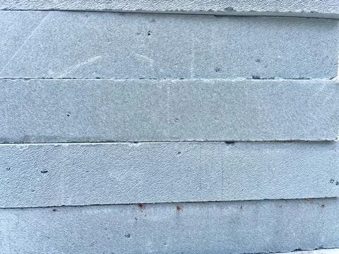 ​Stack of grey lightweight aerated concrete bricks stored horizontally Foto stock