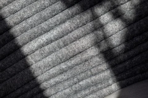 Stack of grey warm fleece blankets. Stock Photos