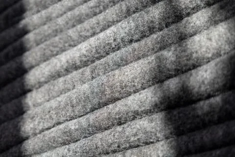 Stack of grey warm fleece blankets. Stock Photos