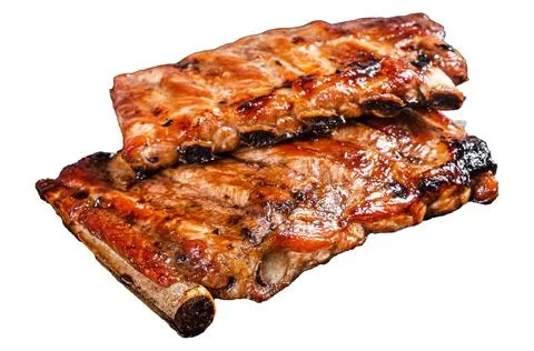 Stack of grilled pork ribs in BBQ sauce on a chopping board. Isolated, whit.. Stock Photos