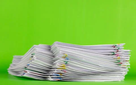 Stack of Group report papers Document on green background. Stock Photos