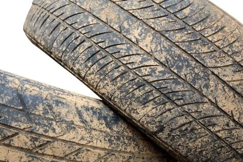 Stack of grunge car tire with brown dirt Stock Photos