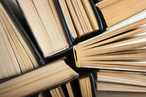 Stack of hadrback books on white background. Library education concept. Back to Foto stock