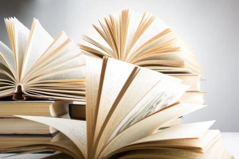 Stack of hadrback books on white background. Library education concept. Back to Stock-Fotos