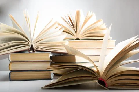 Stack of hadrback books on white background. Library education concept. Back to Foto stock