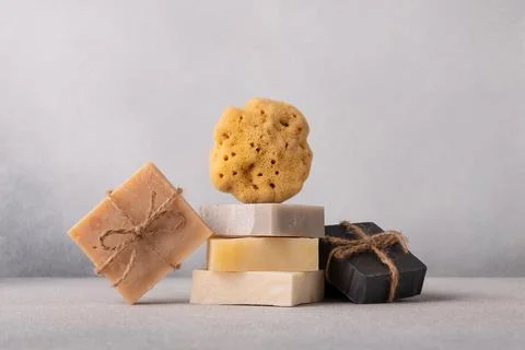 Stack of handcrafted soap bars and natural sea sponge. Natural, organic clean Stock Photos