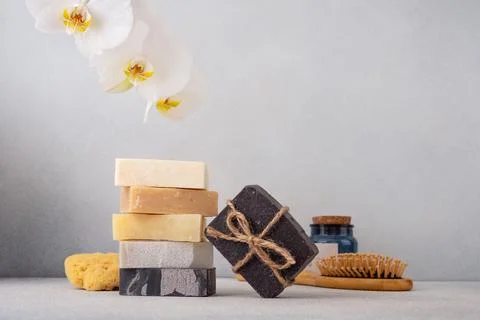 Stack of handcrafted soap bars and natural sponge. Natural, organic cleaning  Stock Photos