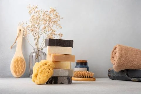 Stack of handcrafted soap bars and natural sponge. Natural, organic cleaning  스톡 사진