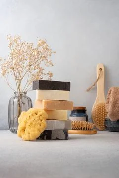 Stack of handcrafted soap bars and natural sponge. Natural, organic cleaning  Foto stock