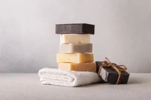 Stack of handcrafted soap bars. Natural, organic cleaning concept. Stock Photos