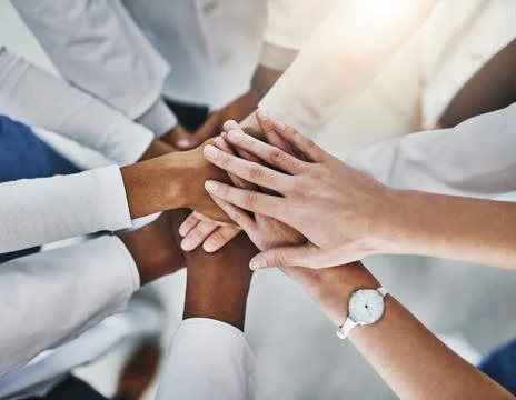 Stack of hands, collaboration and group of doctors in hospital with unity, .. Stock Photos