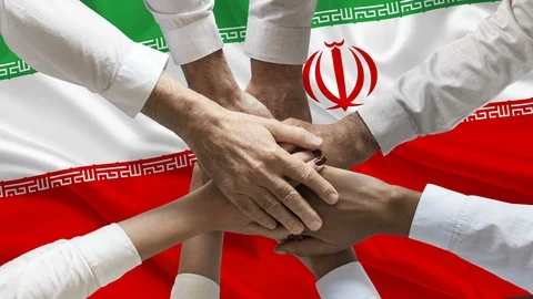 Stack of hands showing unity teamwork over waving iranian flag animation loop Stock Footage 122248761