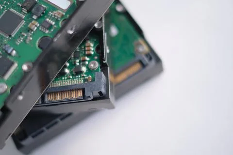 Stack of Hard Disk Drives. Pile of assembled hard drives. Isolated on white Foto stock