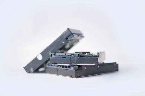Stack of Hard Disk Drives. Pile of assembled hard drives. Isolated on white. Stock Photos