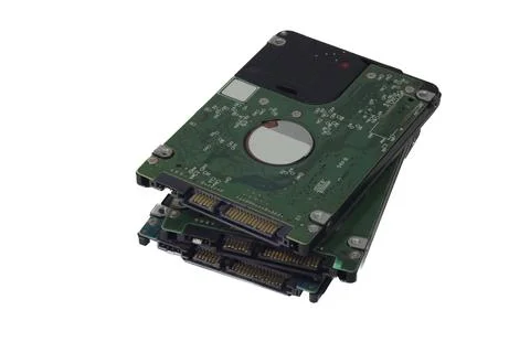 Stack of Hard Disk Drives on White Background Stock Photos