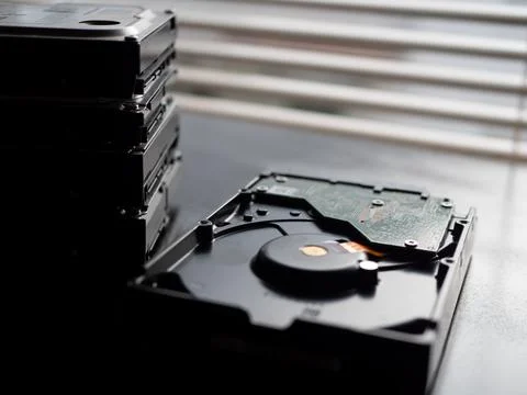 Stack of Hard Drives on a Desk Foto stock