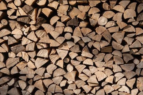 Stack of hard wood from trees used to make charcoal or burned in a fireplace Stock-Fotos