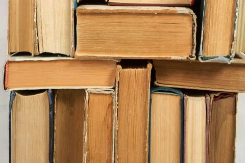 Stack of hardback books on table. Top view Foto stock