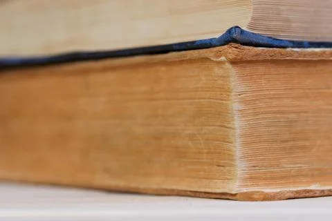 Stack of hardback books on wooden table. Back to school Stock Photos