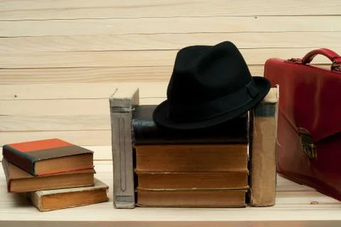 Stack of hardback books on wooden table. Back to school. Stock Photos