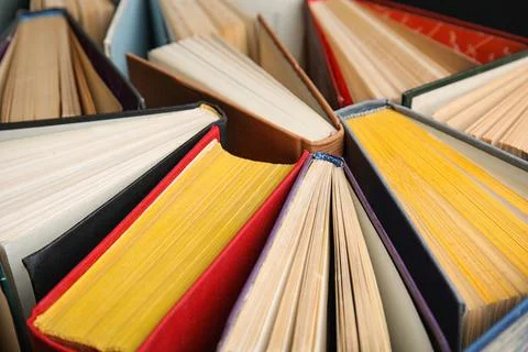 Stack of hardcover books as background, closeup Stock Photos