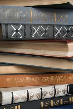 Stack of hardcover books as background, closeup Stock Photos