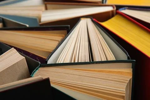 Stack of hardcover books as background, closeup Stock Photos