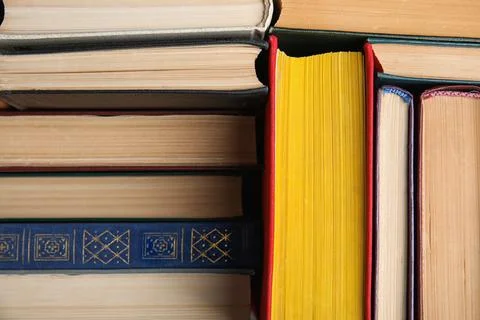 Stack of hardcover books as background, closeup Stock Photos