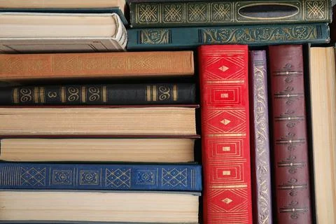 Stack of hardcover books as background, top view Stock Photos