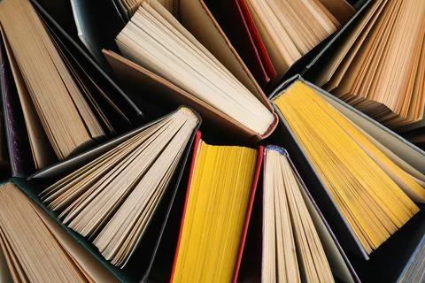Stack of hardcover books as background, top view Stock Photos