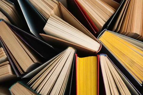 Stack of hardcover books as background, top view Stock Photos