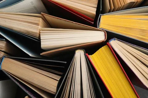 Stack of hardcover books as background, top view Stock Photos