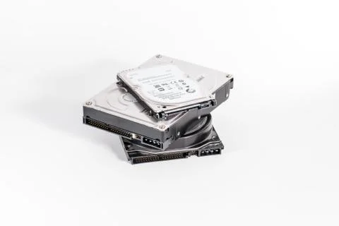 Stack of harddrives on white background Stock Photos