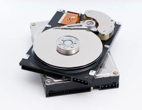 Stack of harddrives on white background Stock Photos