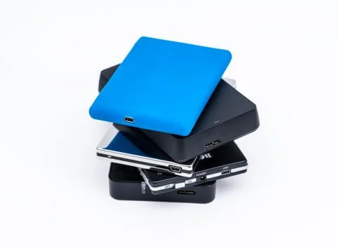Stack of harddrives on white background Stock Photos