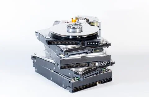 Stack of harddrives on white background Stock Photos