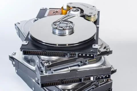 Stack of harddrives on white background Stock Photos