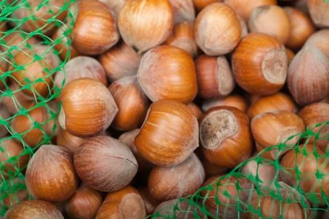 Stack of hazelnuts background Stock Photos