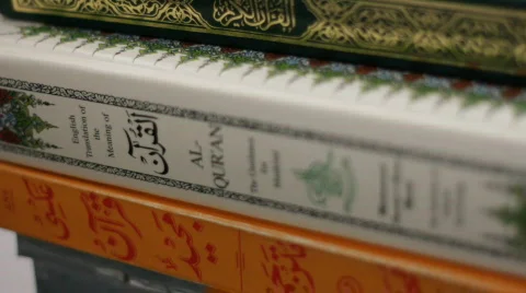 Stack of Holy Qurans on top of each other Stock Footage 738439