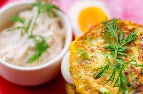A stack of home-made pancakes with cheese and salmon Stock-Fotos