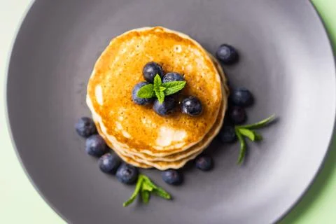 Stack of home made pancakes with fresh berries Stock Photos