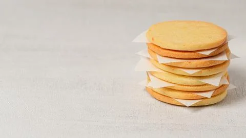 Stack of homemade cookies on a grey background. Copy space Stock Photos