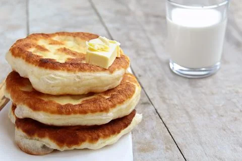 Stack of homemade fried flatbreads on the table Fotos Stock